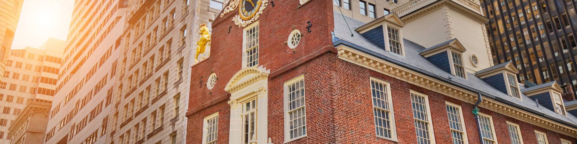 Boston downtown streets near Old State House at sunset