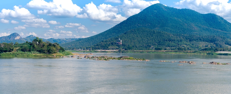 beautiful panorama landscape view of Kaeng Khut Khu (set of islets in the middle of Mae Khong River) with mountain, Mekong river and blue sky at Chiang Khan district, Loei province, Thailand