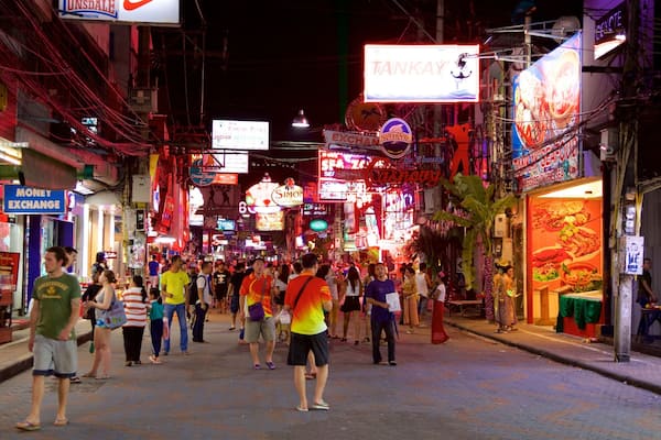 Walking Street featuring markets and night scenes as well as a large group of people