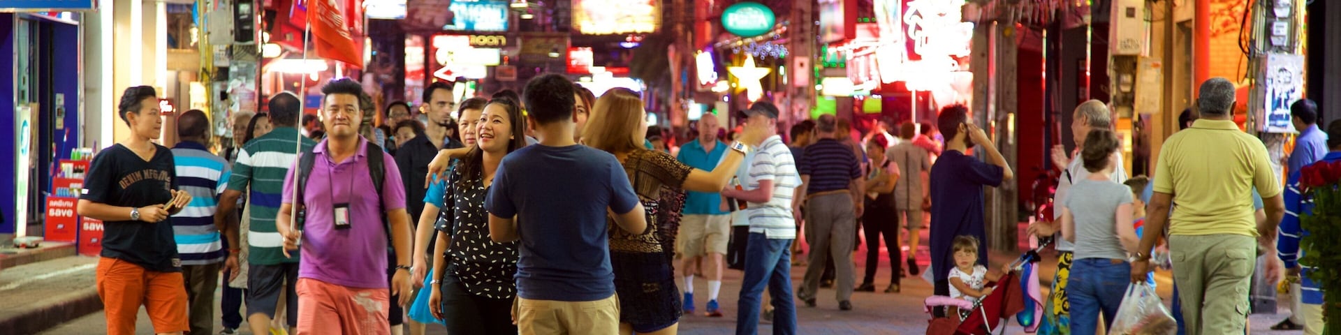 Walking Street featuring night scenes and markets as well as a large group of people