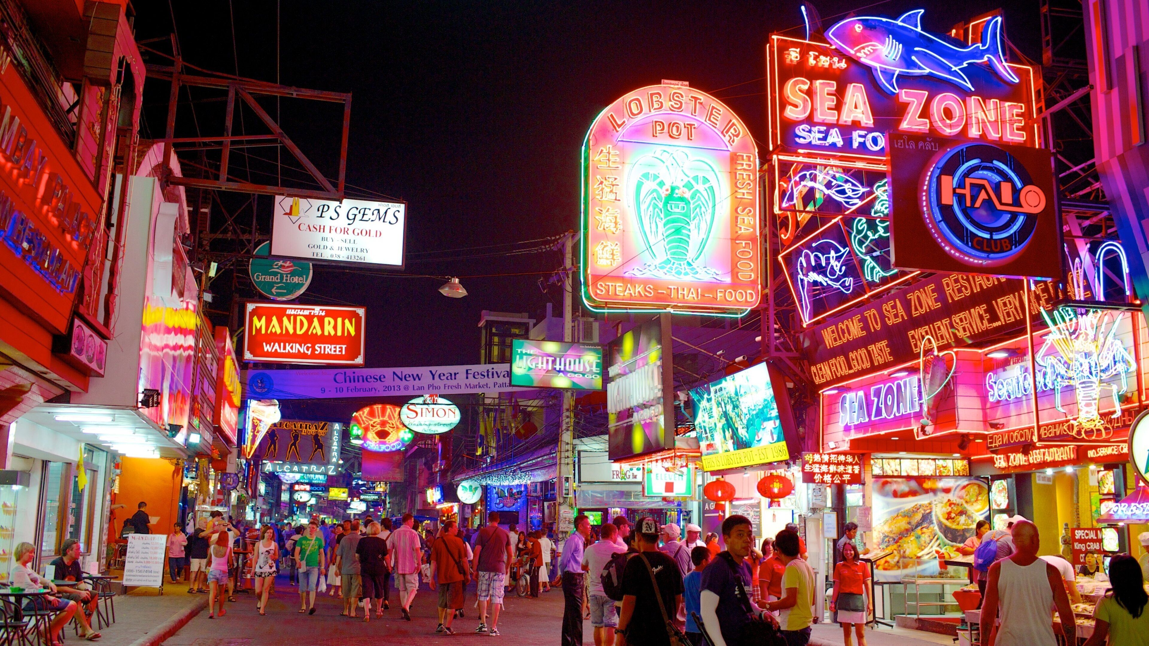 Walking Street which includes night scenes, a city and signage