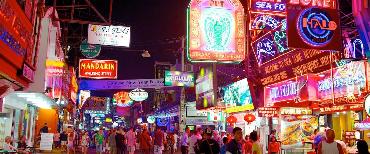 Walking Street which includes night scenes, a city and signage