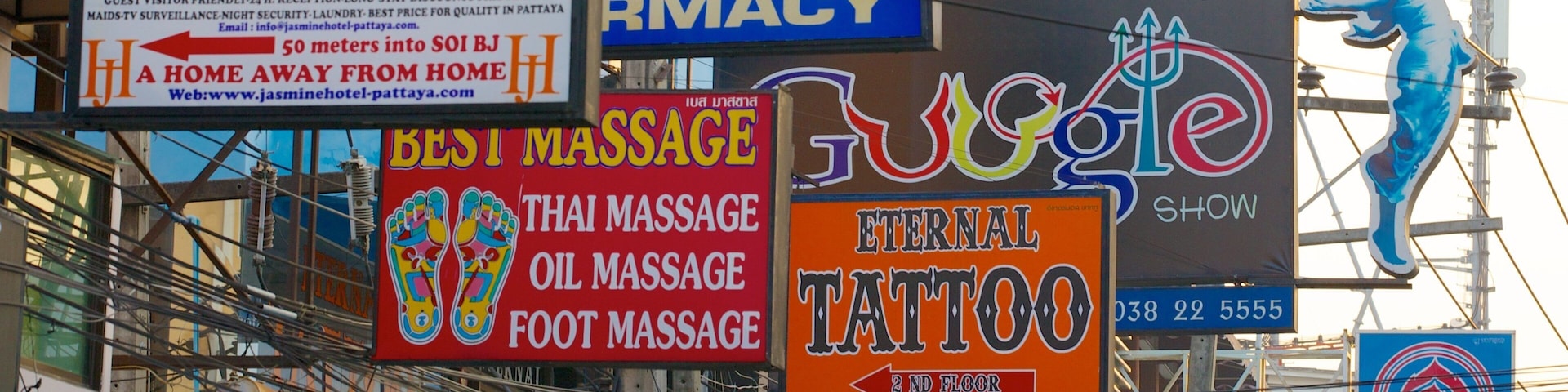 Walking Street showing street scenes, signage and a city