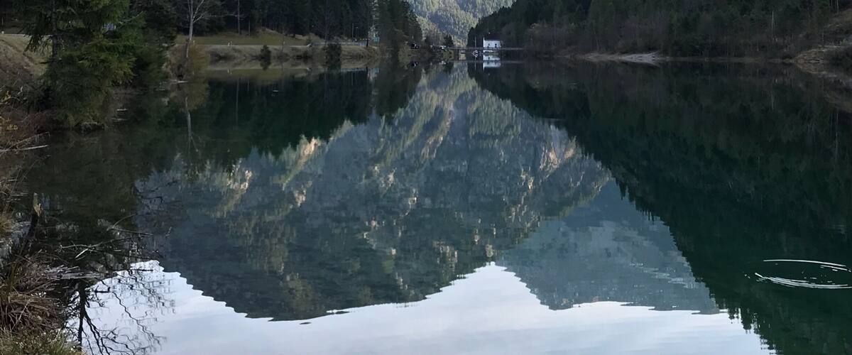 Clear and no wind. reflection on Plansee (Map Lake?) Austria