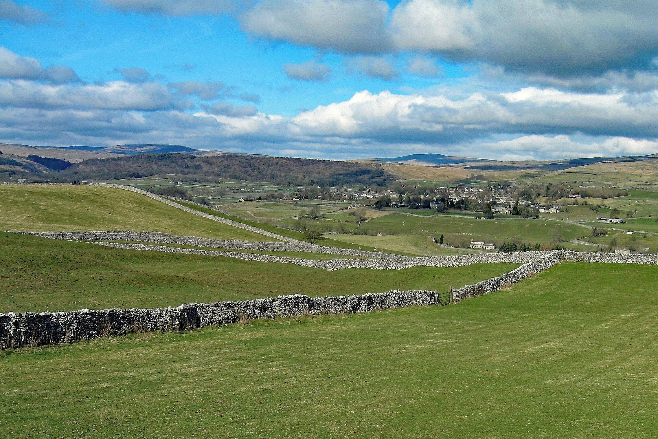 A view back to the lovely town of Grassington in the heart of the Yorkshire Dales. Photo taken from a moorland walk between the villages of Burnsall and Linton.  The grey of the Yorkshire stone highlights the wonderful green countryside. Combine that with wonderful country pubs, good food, coffee shops & friendy people. #GreatOutdoors