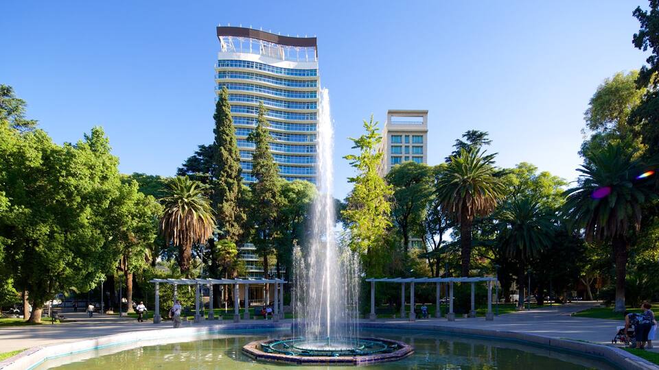 Plaza Italia which includes a city, a fountain and a square or plaza