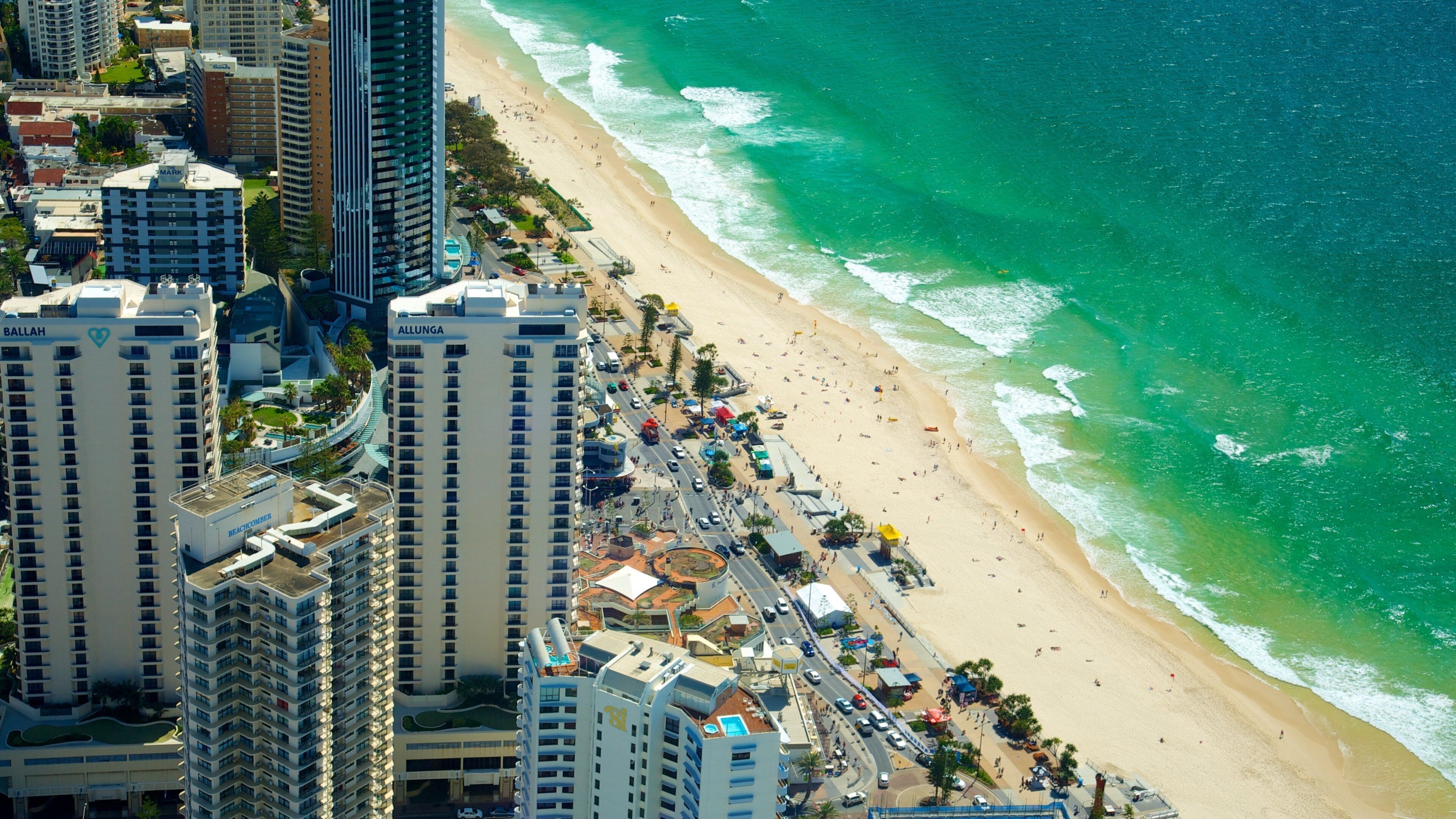 SkyPoint Observation Deck featuring a high rise building, a coastal town and a sandy beach