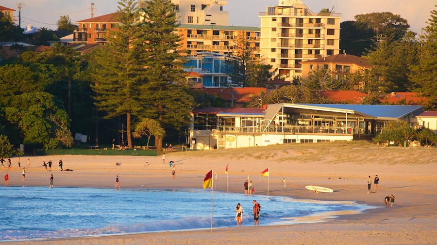 Coolangatta Beach featuring a coastal town, a beach and a sunset