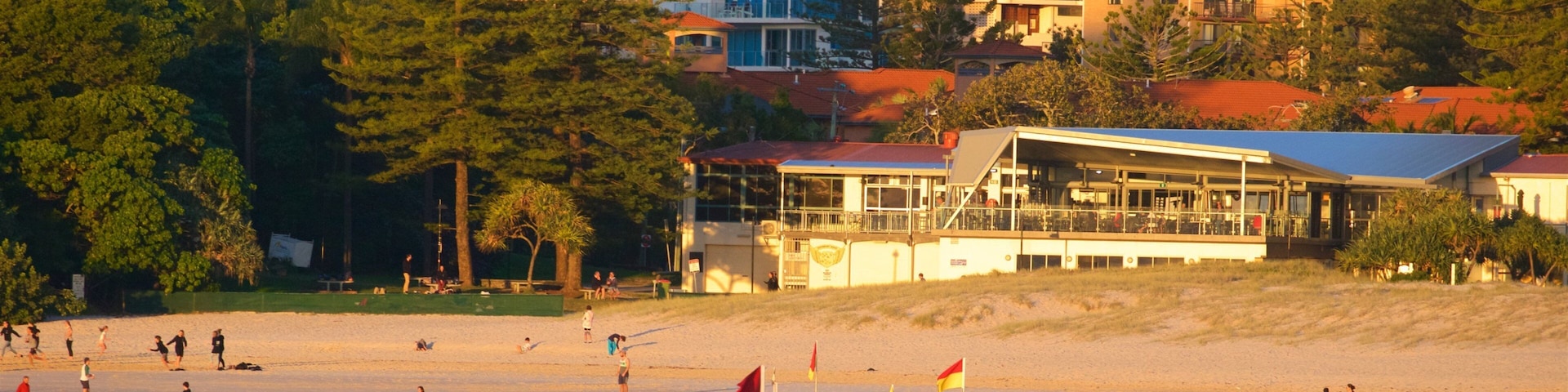 Coolangatta Beach featuring a coastal town, a beach and a sunset