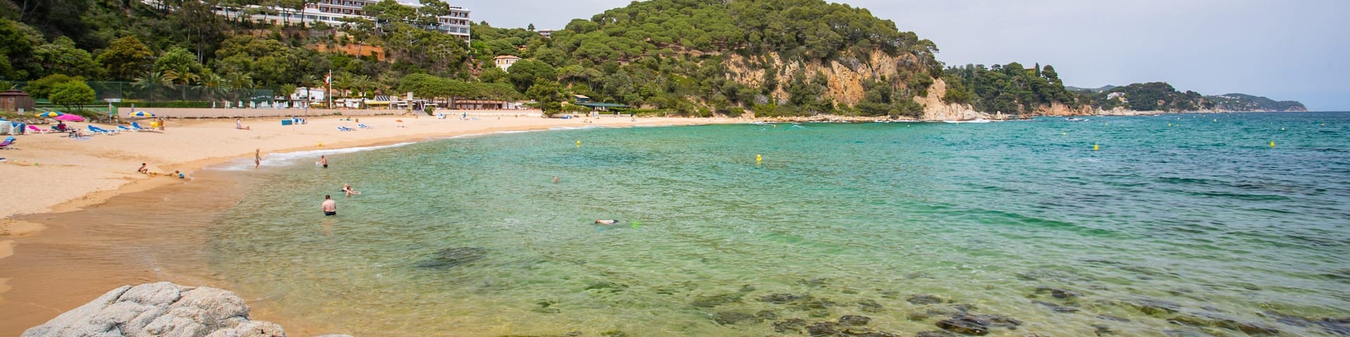 Santa Cristina Beach which includes a sandy beach and general coastal views