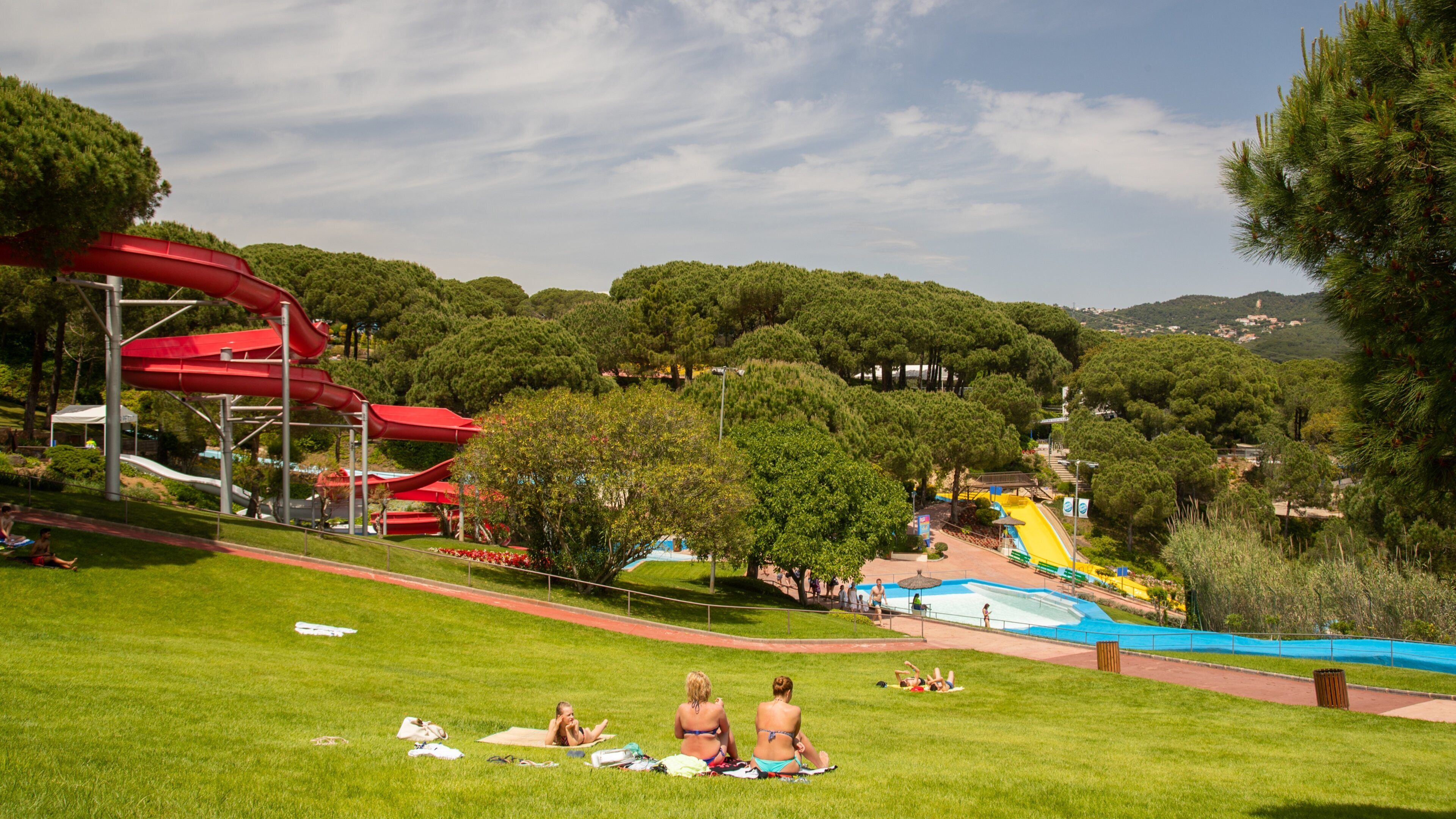 Water World showing a waterpark as well as a small group of people