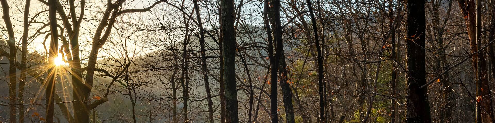 Sunset over the Sugar Hollow Reservoir in winter. Reservoir is source of water for Charlottesville, Virginia.