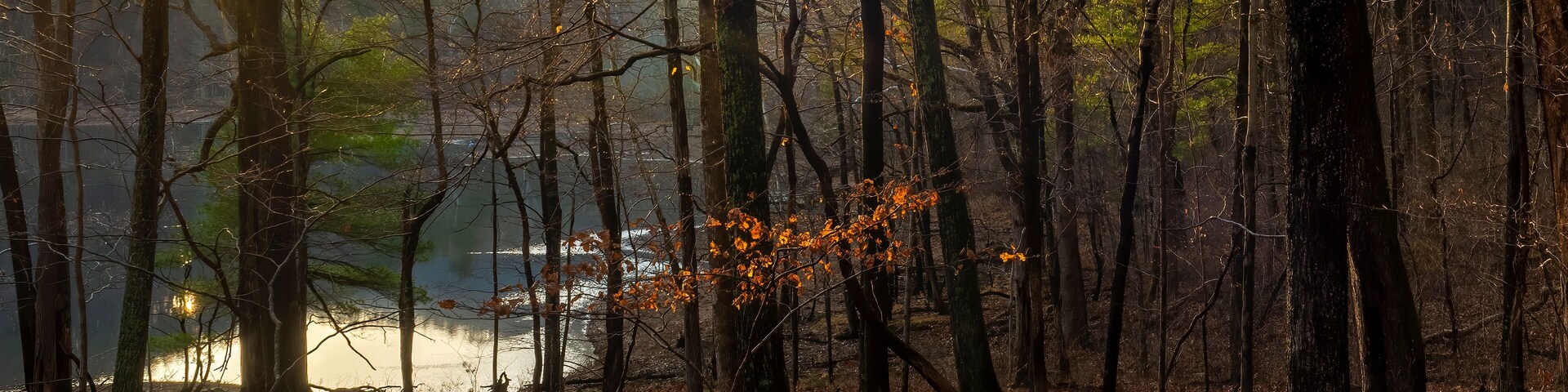 Sunset over the Sugar Hollow Reservoir in winter. Reservoir is source of water for Charlottesville, Virginia.