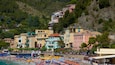 Monterosso Beach showing a sandy beach, a coastal town and general coastal views