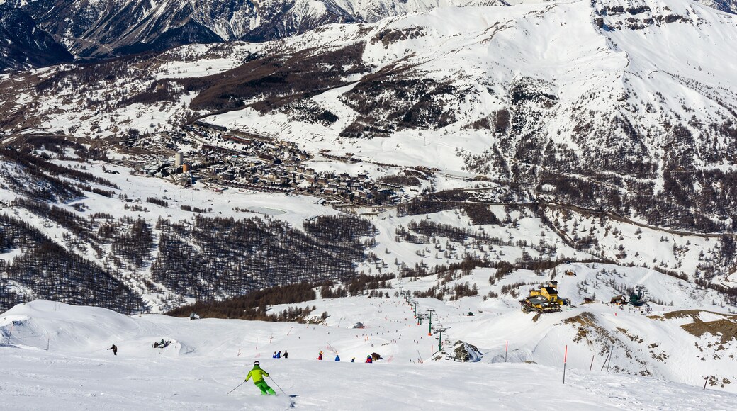 View over the snow-clad slopes of Sestriere in the Milky Way ski resort in Piedmont.