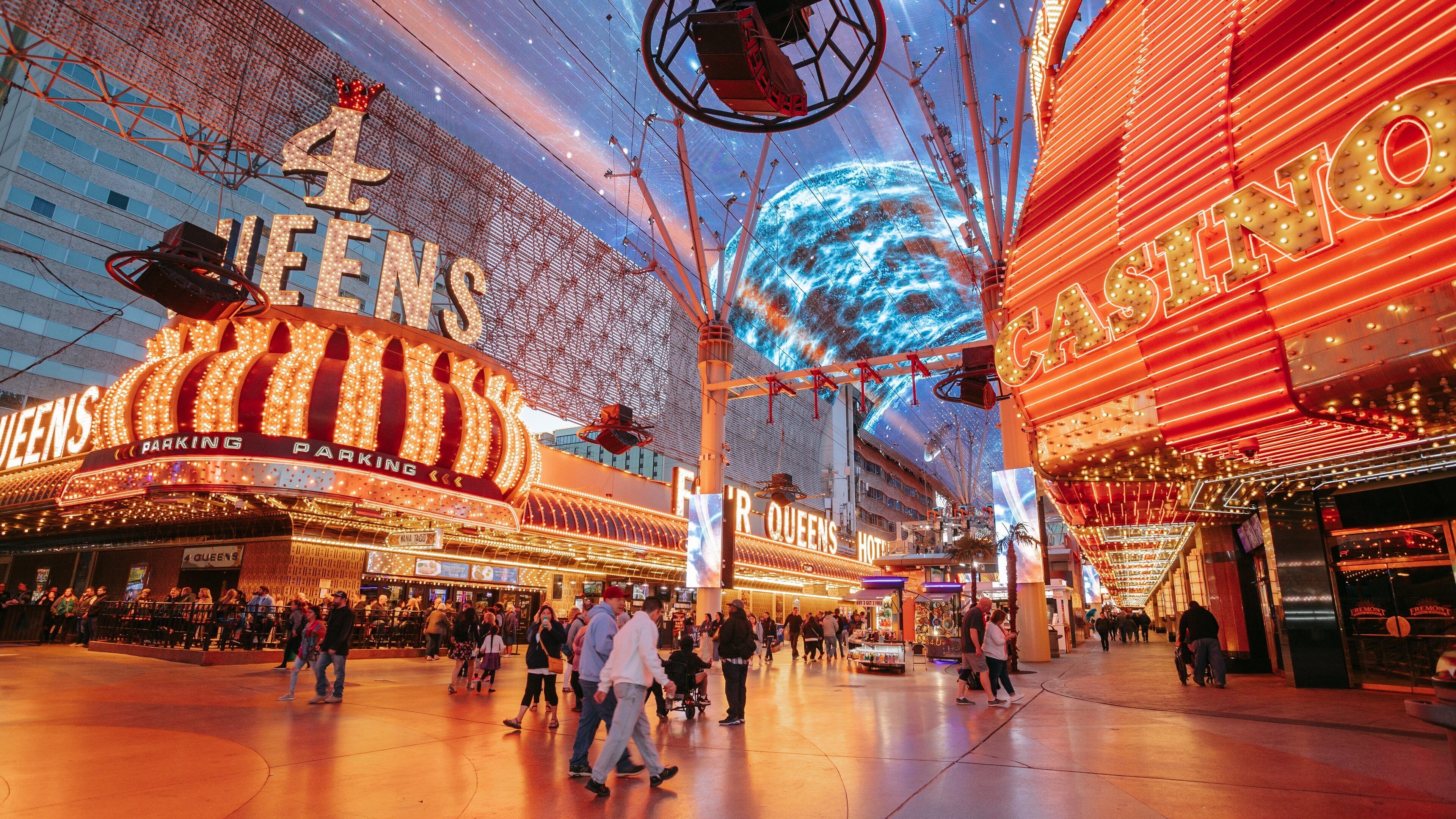 Fremont Street Experience which includes street scenes, night scenes and signage