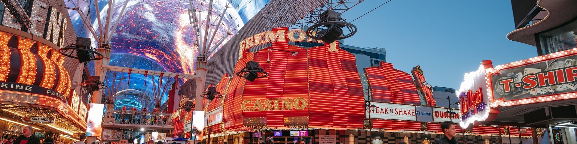 Fremont Street Experience which includes signage, street scenes and night scenes