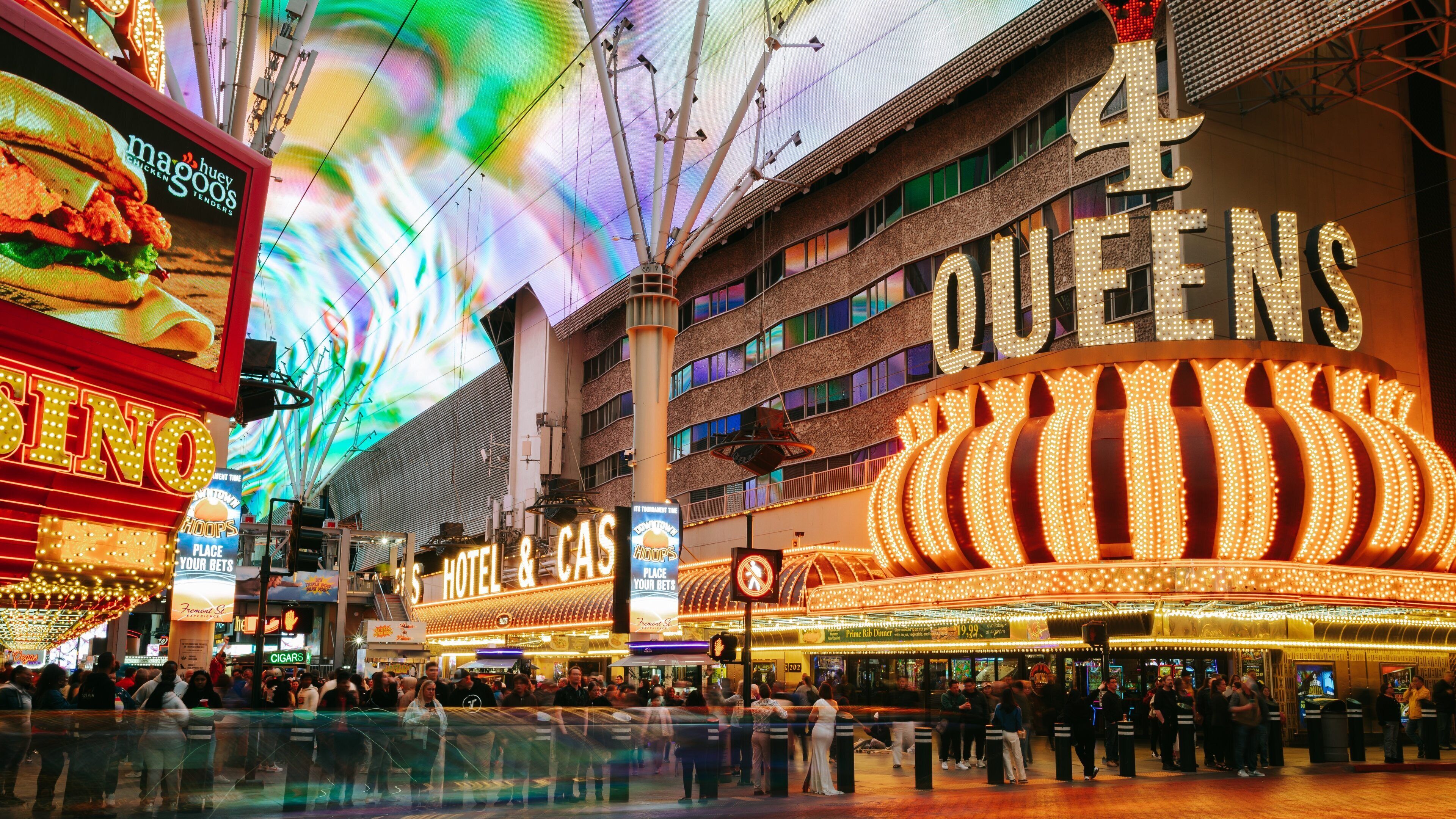 Fremont Street Experience which includes street scenes, signage and night scenes