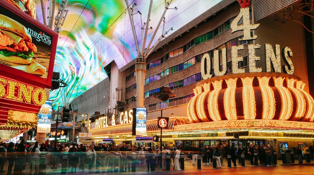Fremont Street Experience which includes street scenes, signage and night scenes