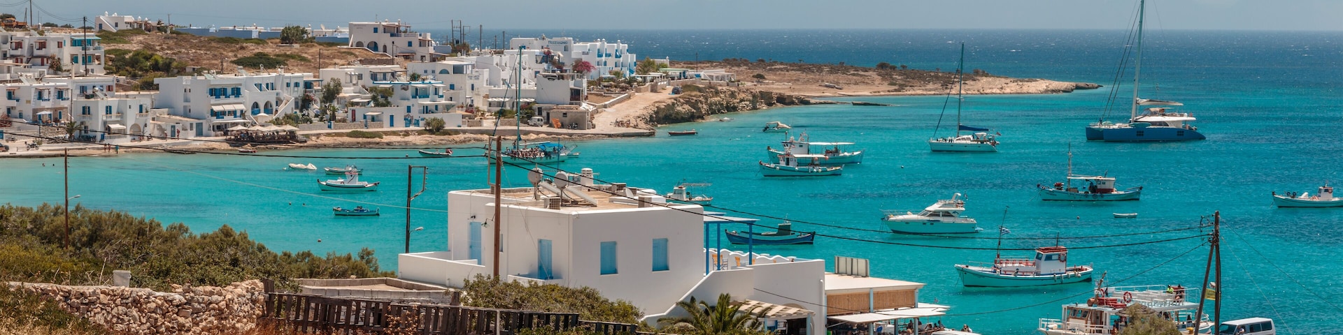 Panoramic view of boats at anchor in the bay off Koufonisia, Greek Island in the Little Cyclades