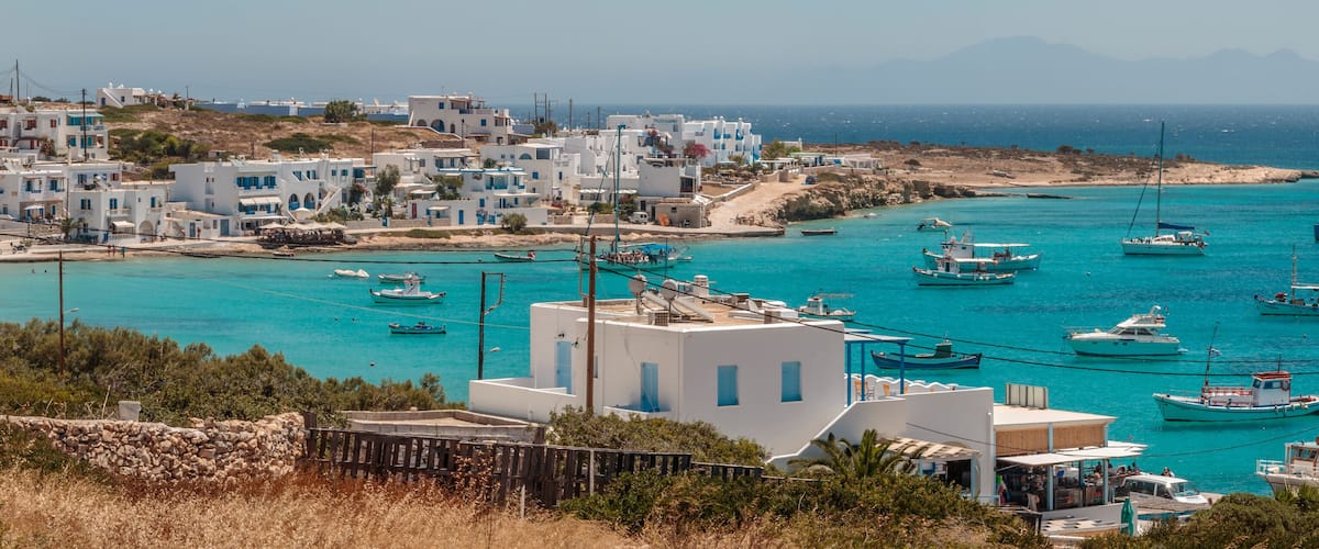 Panoramic view of boats at anchor in the bay off Koufonisia, Greek Island in the Little Cyclades