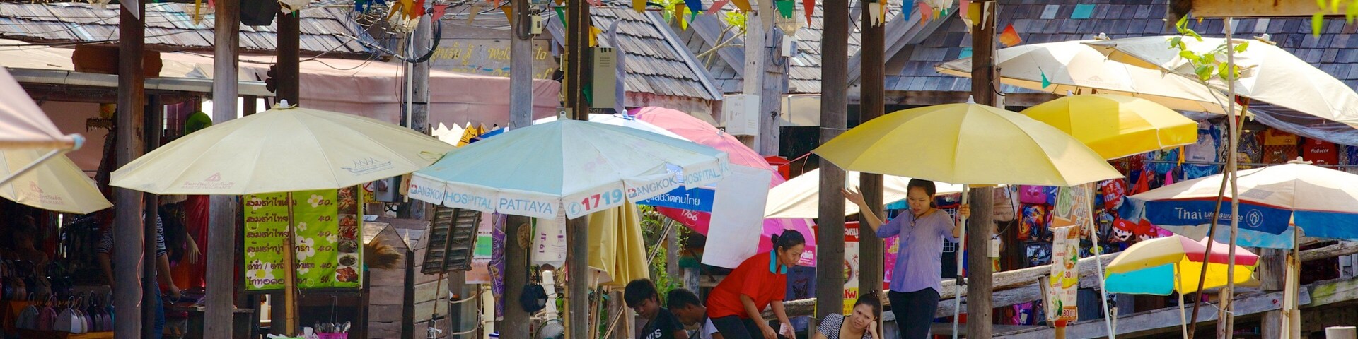 Pattaya Floating Market featuring a river or creek and markets