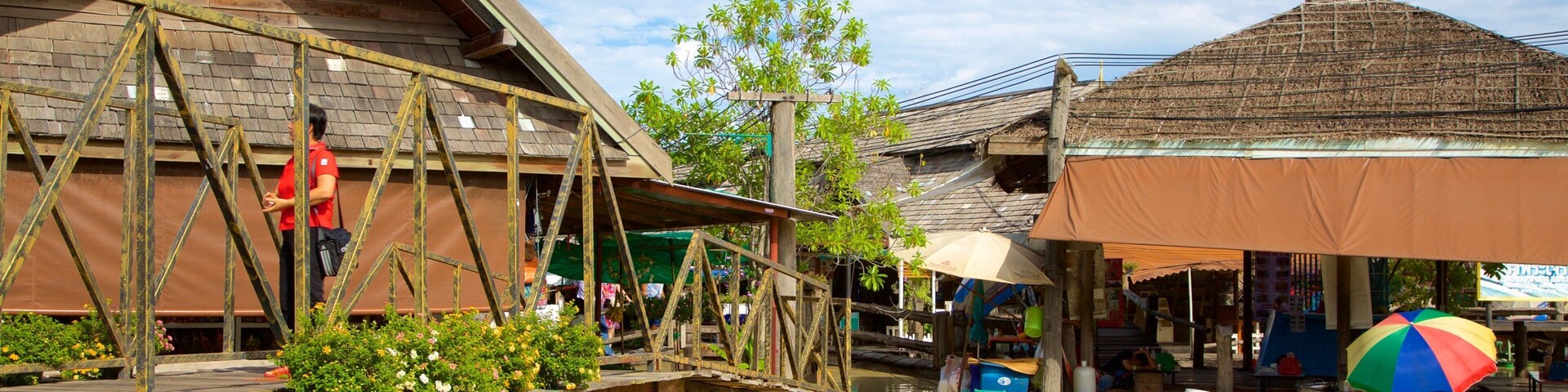 Pattaya Floating Market featuring a bridge and a river or creek