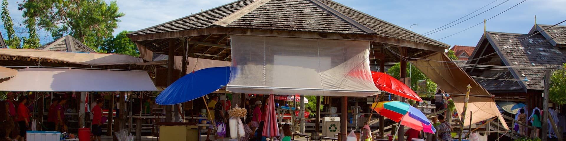 Pattaya Floating Market showing markets and a river or creek