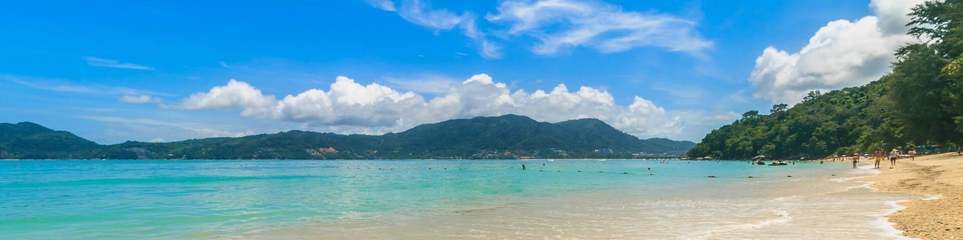 Clear water and blue sky. in Tri Trang Beach Phuket, Thailand.; Shutterstock ID 1097515340; Purchase Order: SP-2398 Go Guides; Client/Licensee: Hotels.com