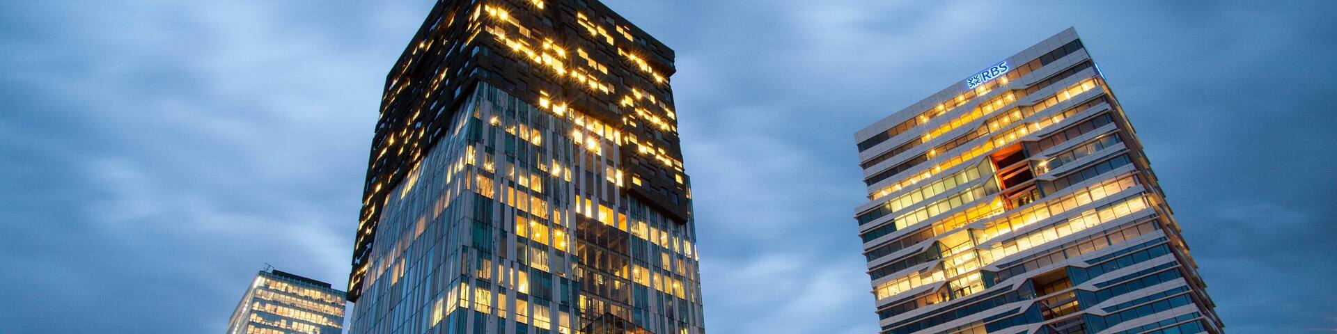 World Trade Center showing a skyscraper and night scenes