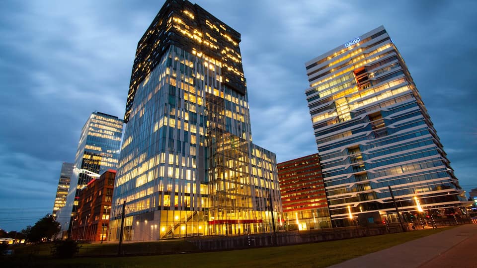 World Trade Center showing a skyscraper and night scenes