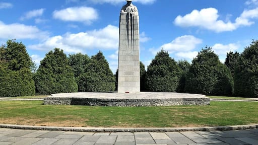 We drove the Ypres Salient in the Flanders region of Belgium to visit the memorial sites from World War I. Of particular interest to us were the Canadian memorials along the way.
The Brooding Soldier was the most poignant memorial we came across. The imposing granite statue faces the same direction where the first German gas attack took place. 2,000 Canadian soldiers died in this area. It is as if the soldier stands guard over the fallen men of combat.