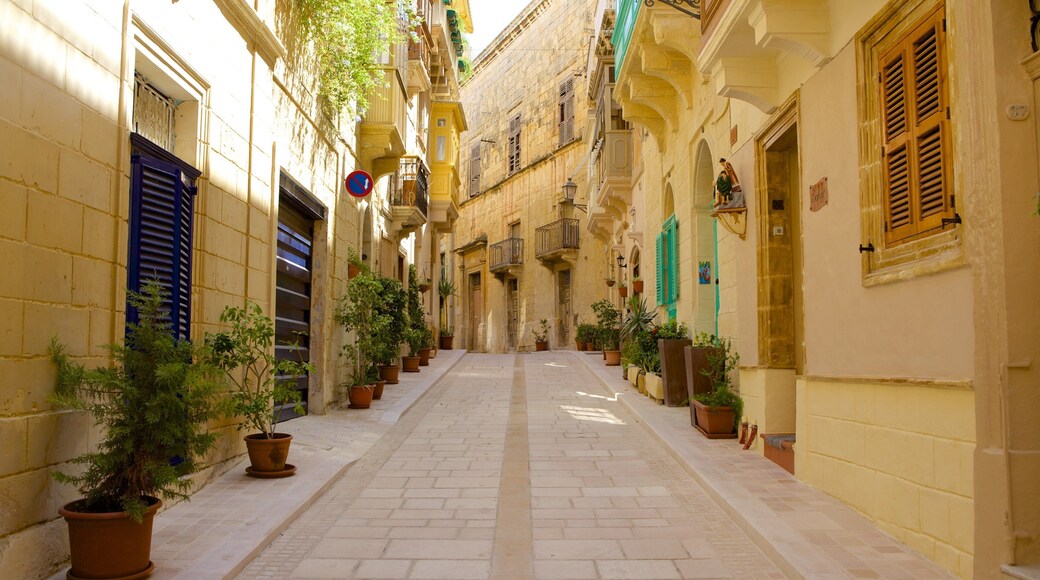 Kalkara which includes a house and street scenes