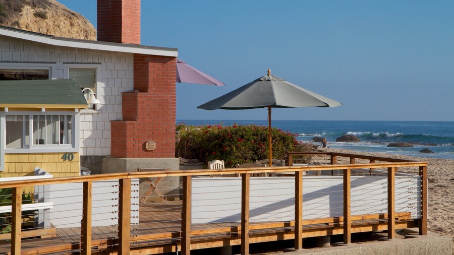 Crystal Cove State Park showing a house and general coastal views