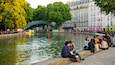 Canal Saint-Martin featuring a river or creek