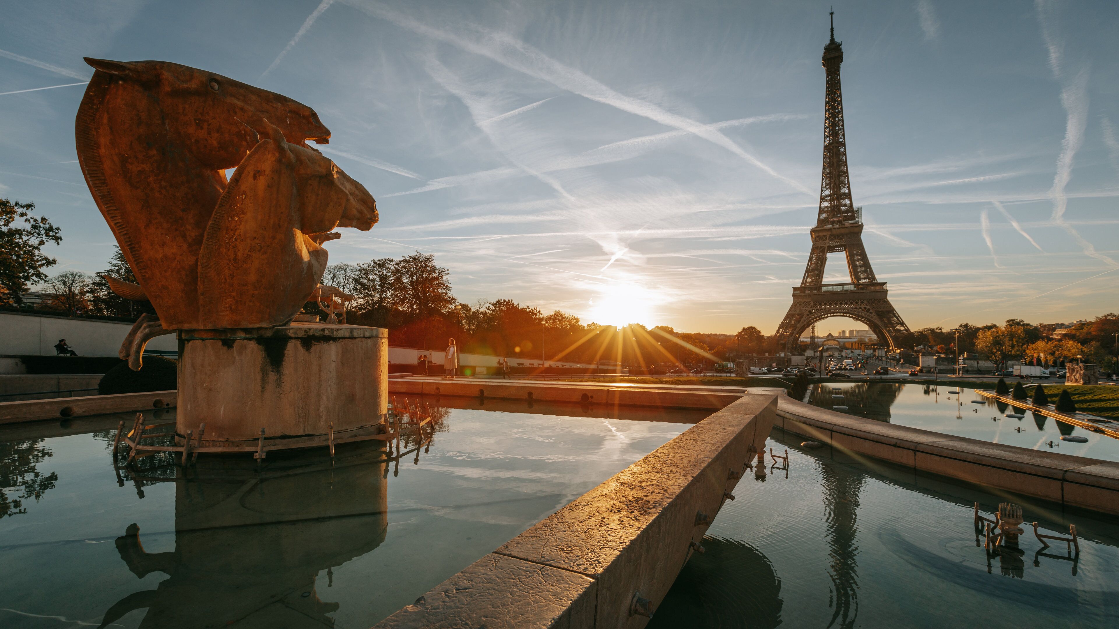 Place du Trocadéro featuring a sunset and a monument