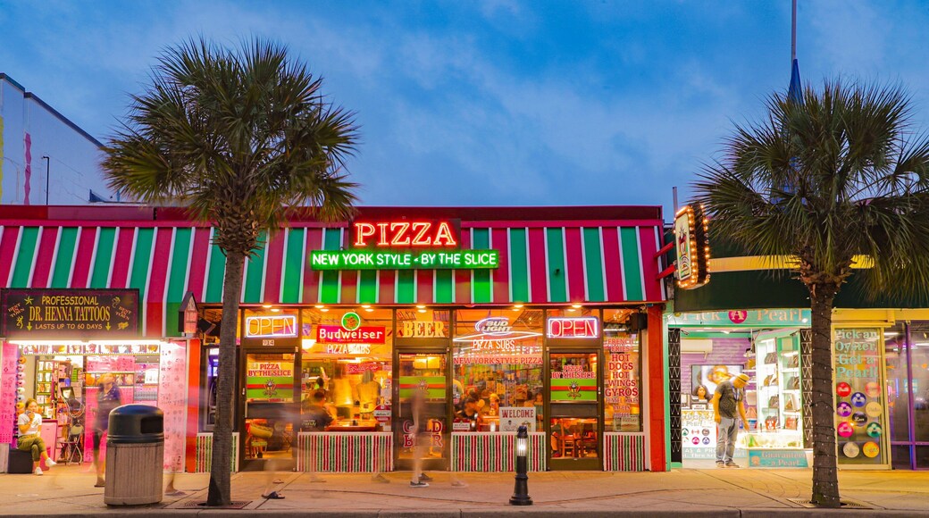 Myrtle Beach Boardwalk which includes signage and night scenes