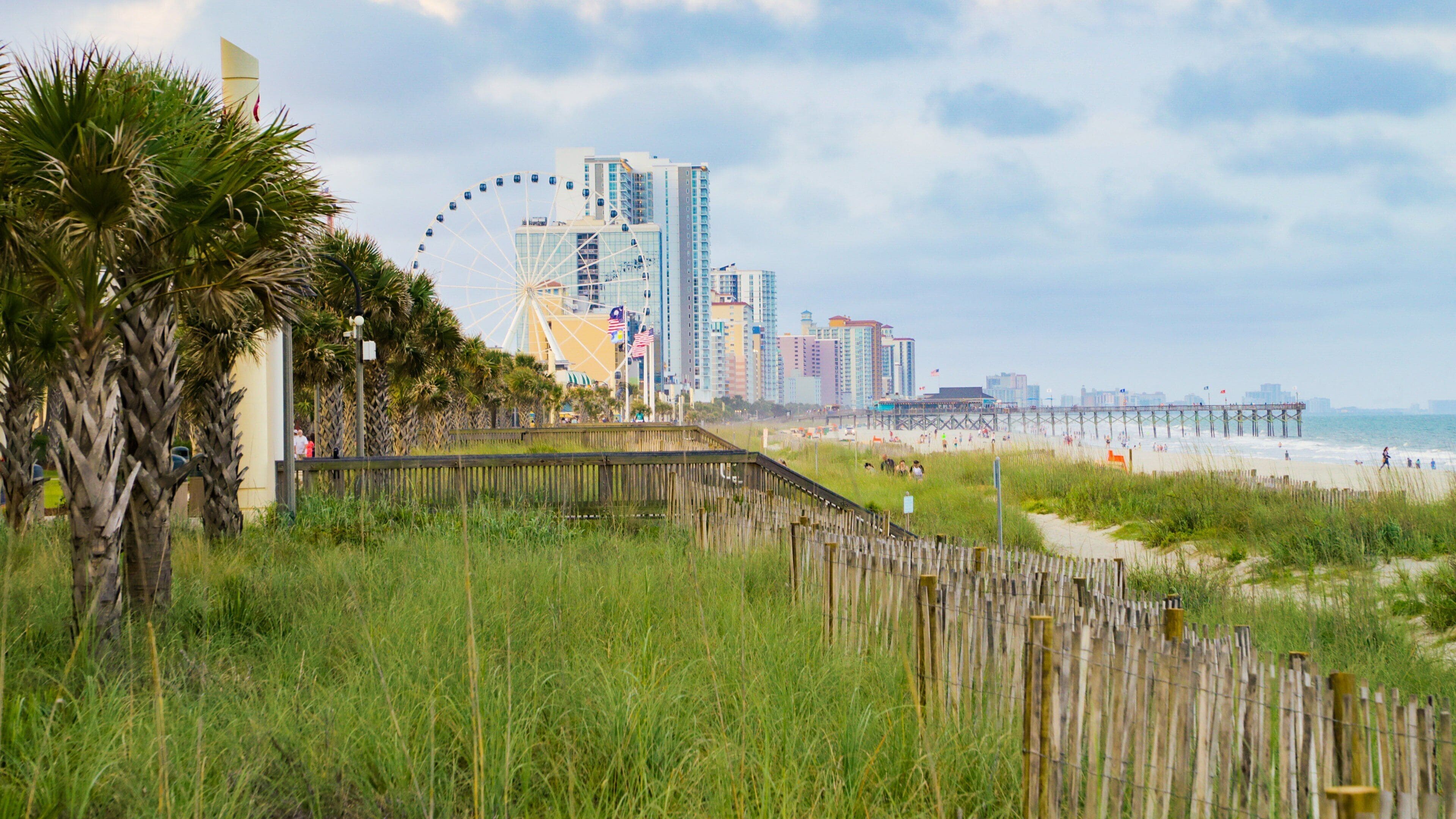 Myrtle Beach Boardwalk showing a coastal town and general coastal views