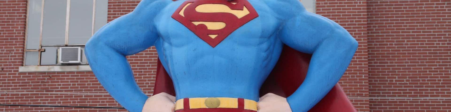 Superman Statue which includes a statue or sculpture