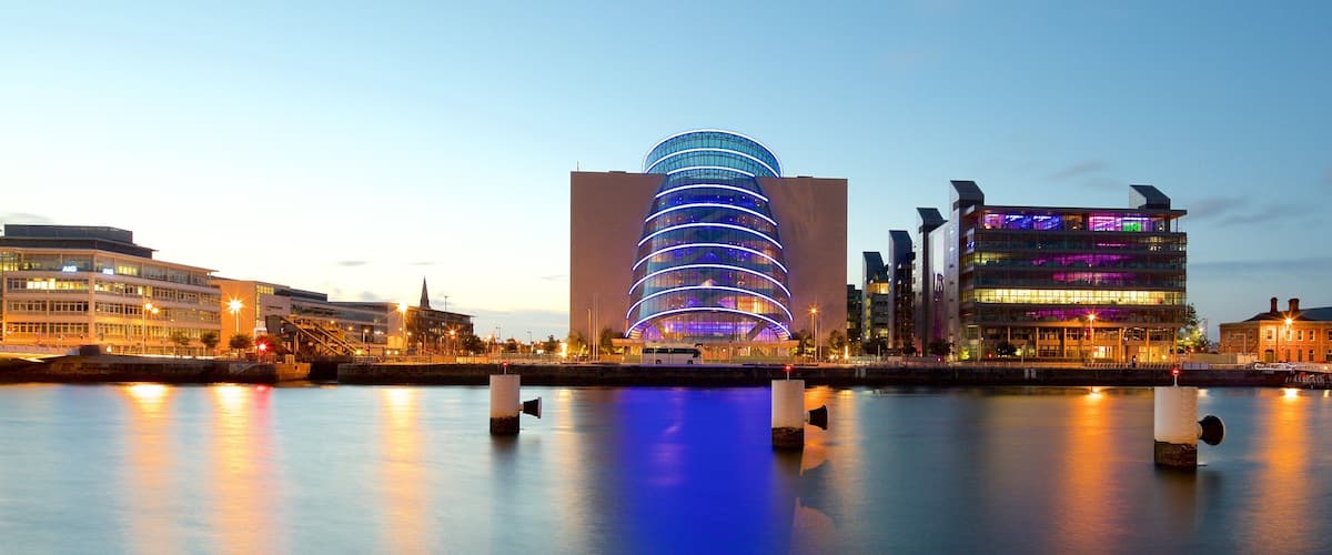 The Convention Centre Dublin showing a city, modern architecture and a river or creek