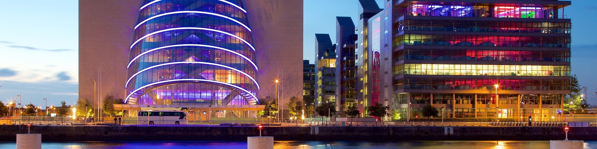 The Convention Centre Dublin showing modern architecture, a river or creek and a city