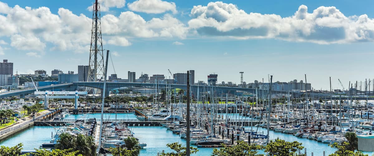 Leisure boats lined in the Ginowan harbor marina seen from Okinawa conversion center