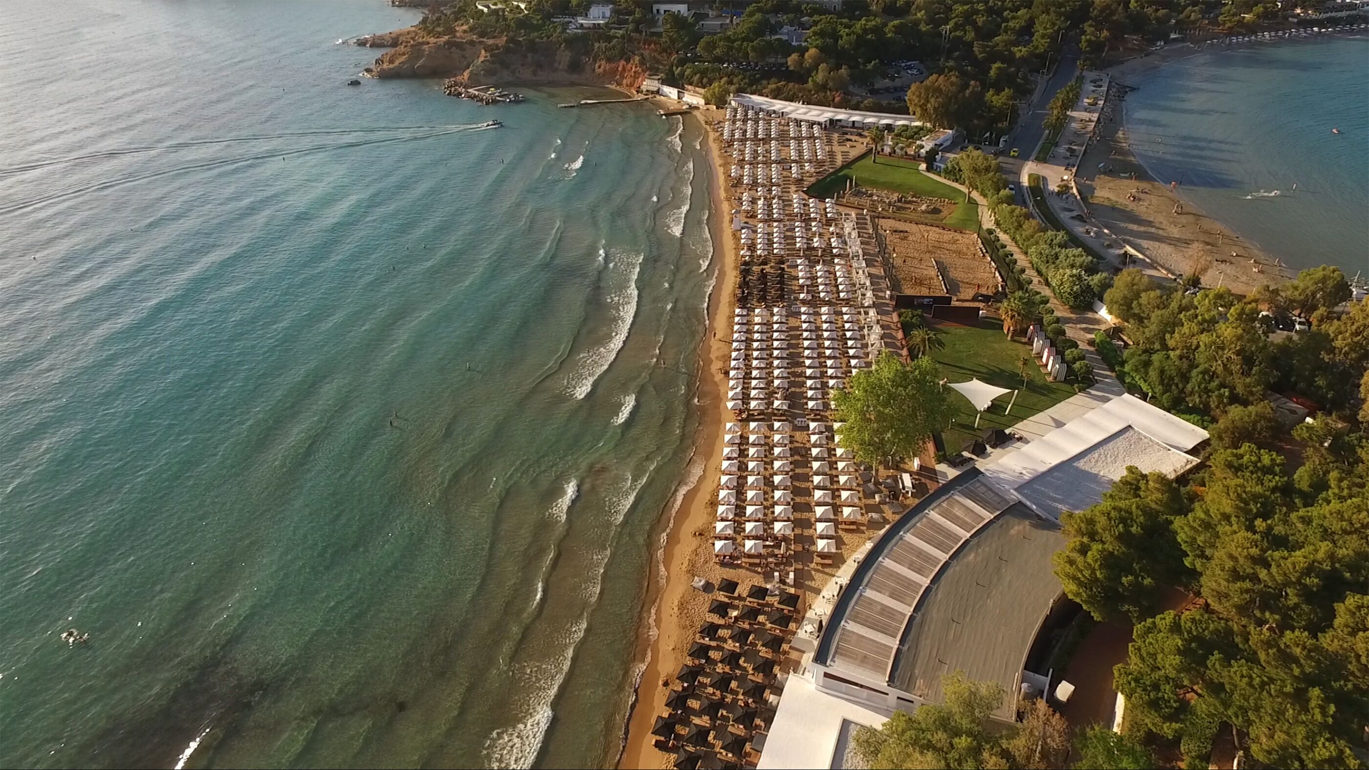 Aerial drone photo of iconic beach of Astir in Vouliagmeni, Athens Riviera, Greece