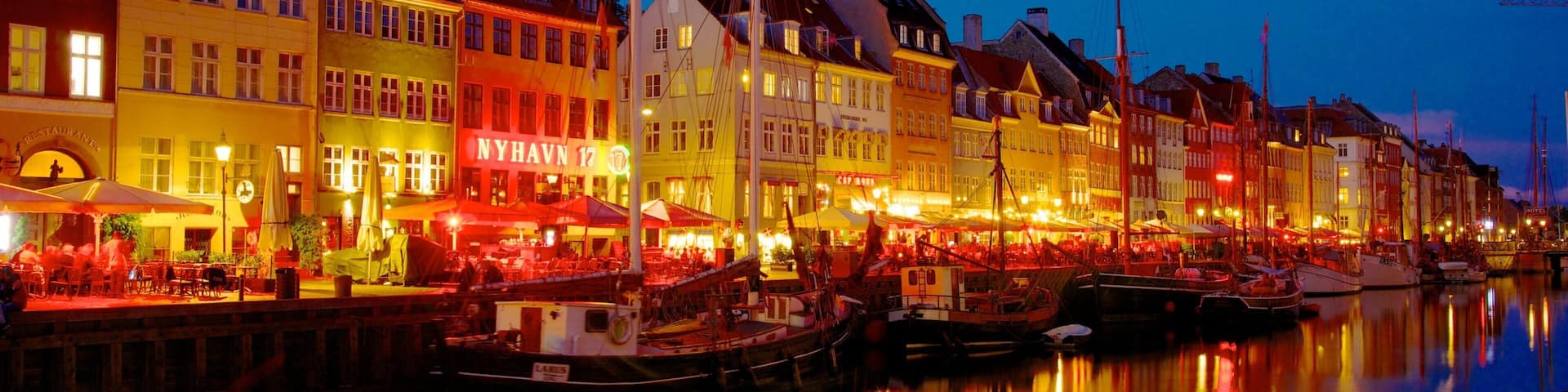 Nyhavn featuring a marina, night scenes and a city