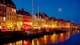 Nyhavn featuring a marina, night scenes and a city