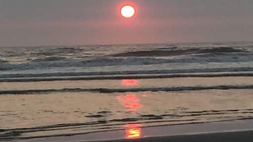 Loved seeing this sunset through the smoke haze coming from British Columbia and Washington. So much beach when the tide is out.