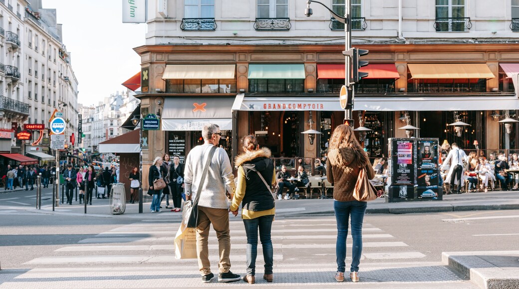 Grands Boulevards showing street scenes as well as a couple