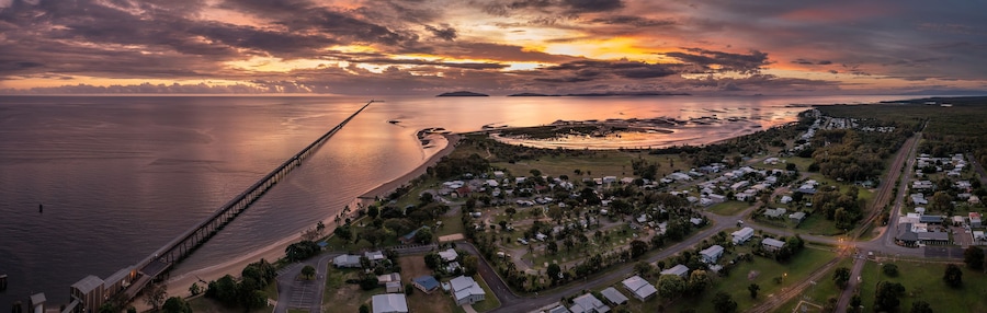 Sunrise view of the famous 6km long sugar cane jetty at Lucinda in Far North Queensland, Australia