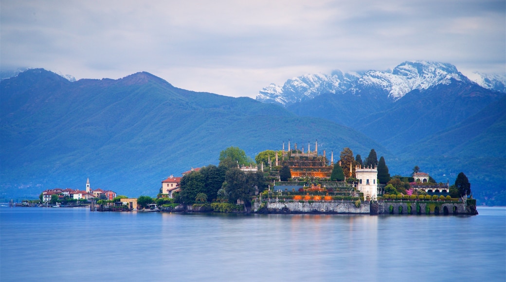 Lake Maggiore featuring mountains, a lake or waterhole and a small town or village