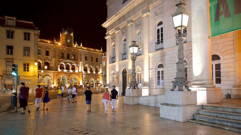 National Theatre of D. Maria II featuring night scenes, a square or plaza and a city